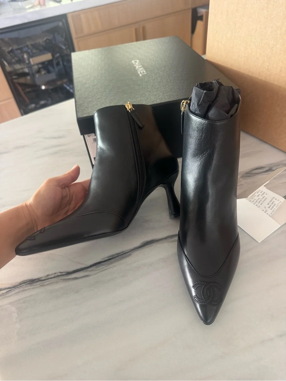 CHANEL Black Leather Pointed Ankle Boots with Sculpted Heel